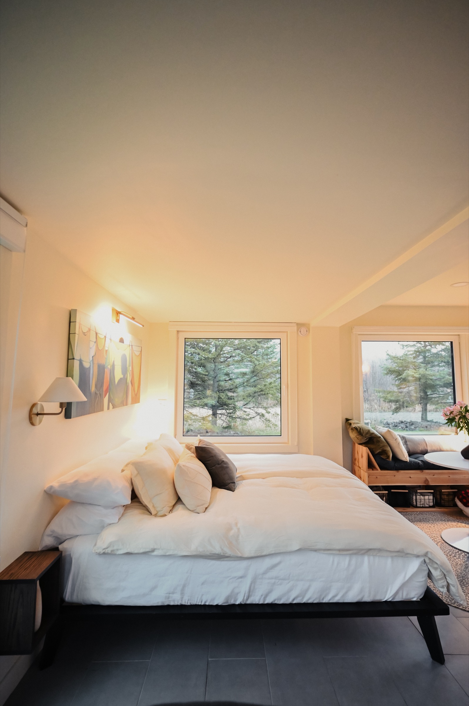 Primary bedroom with king Nectar mattress, linen bedding, and original art
